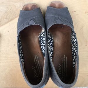 Well loved toms wedges.